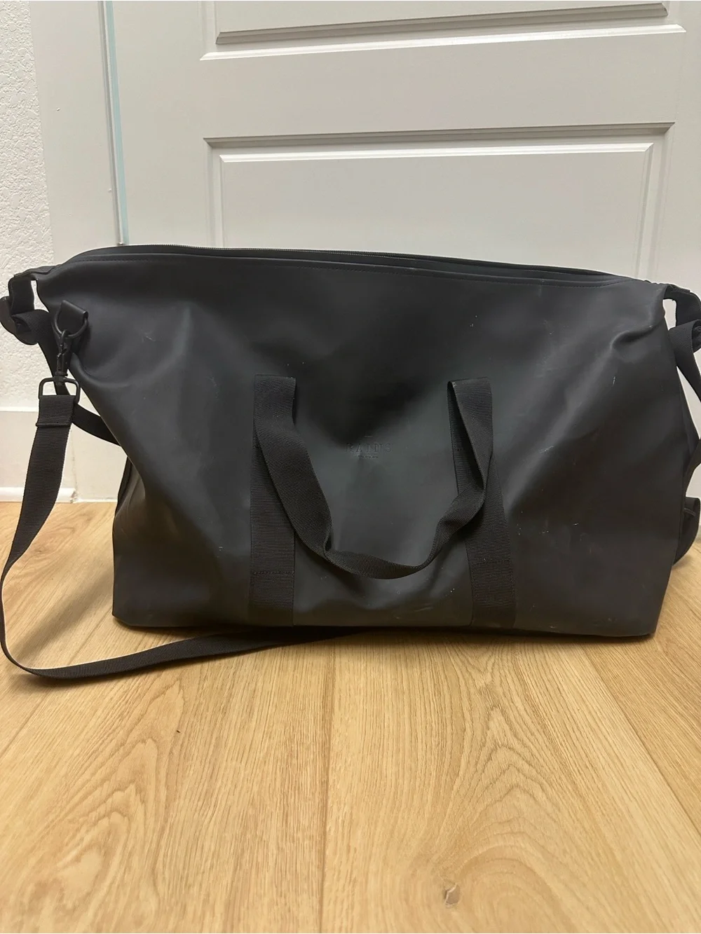 rains Black Duffel Bag